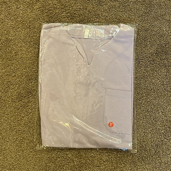 Unisex Grey, Purple, Blue, and White XL short sleeve shirts in package $15 Total - Picture 3 of 5